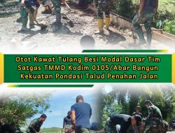 Dengan semangat “otot kawat tulang besi” Tim Satgas TMMD Kodim 0105/Abar Bangun Kekuatan Pondasi Talud Penahan Jalan
