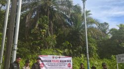 Unit Opsnal Satreskrim Polres Nagan Raya Pasang Spanduk Imbauan Anti-PETI di Kecamatan Beutong