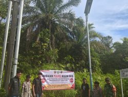 Unit Opsnal Satreskrim Polres Nagan Raya Pasang Spanduk Imbauan Anti-PETI di Kecamatan Beutong