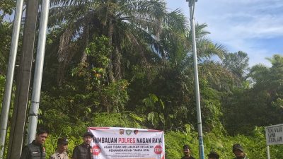 Unit Opsnal Satreskrim Polres Nagan Raya Pasang Spanduk Imbauan Anti-PETI di Kecamatan Beutong